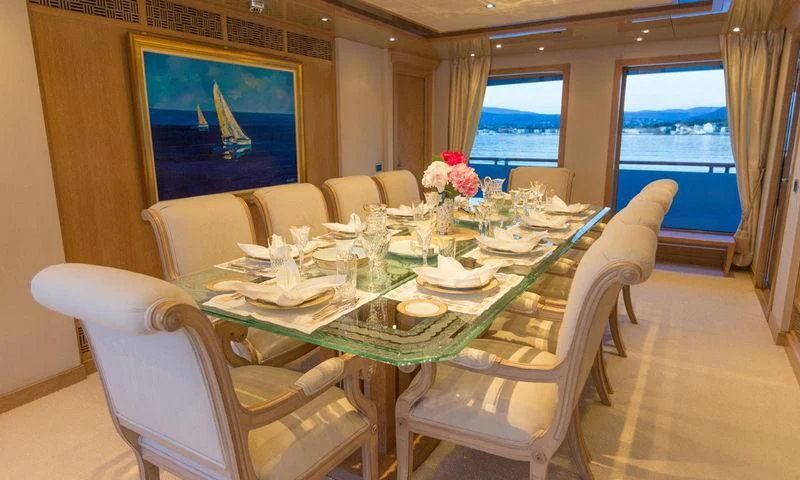 a dining table set for a dinner aboard FRIENDSHIP Yacht for Charter