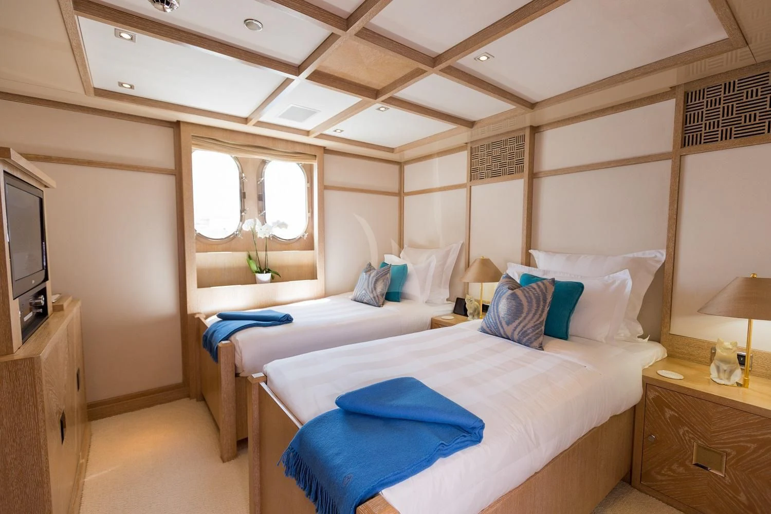 a room with two beds aboard FRIENDSHIP Yacht for Charter