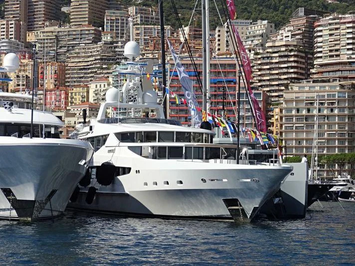 a couple of boats in a harbor aboard FRIENDSHIP Yacht for Charter