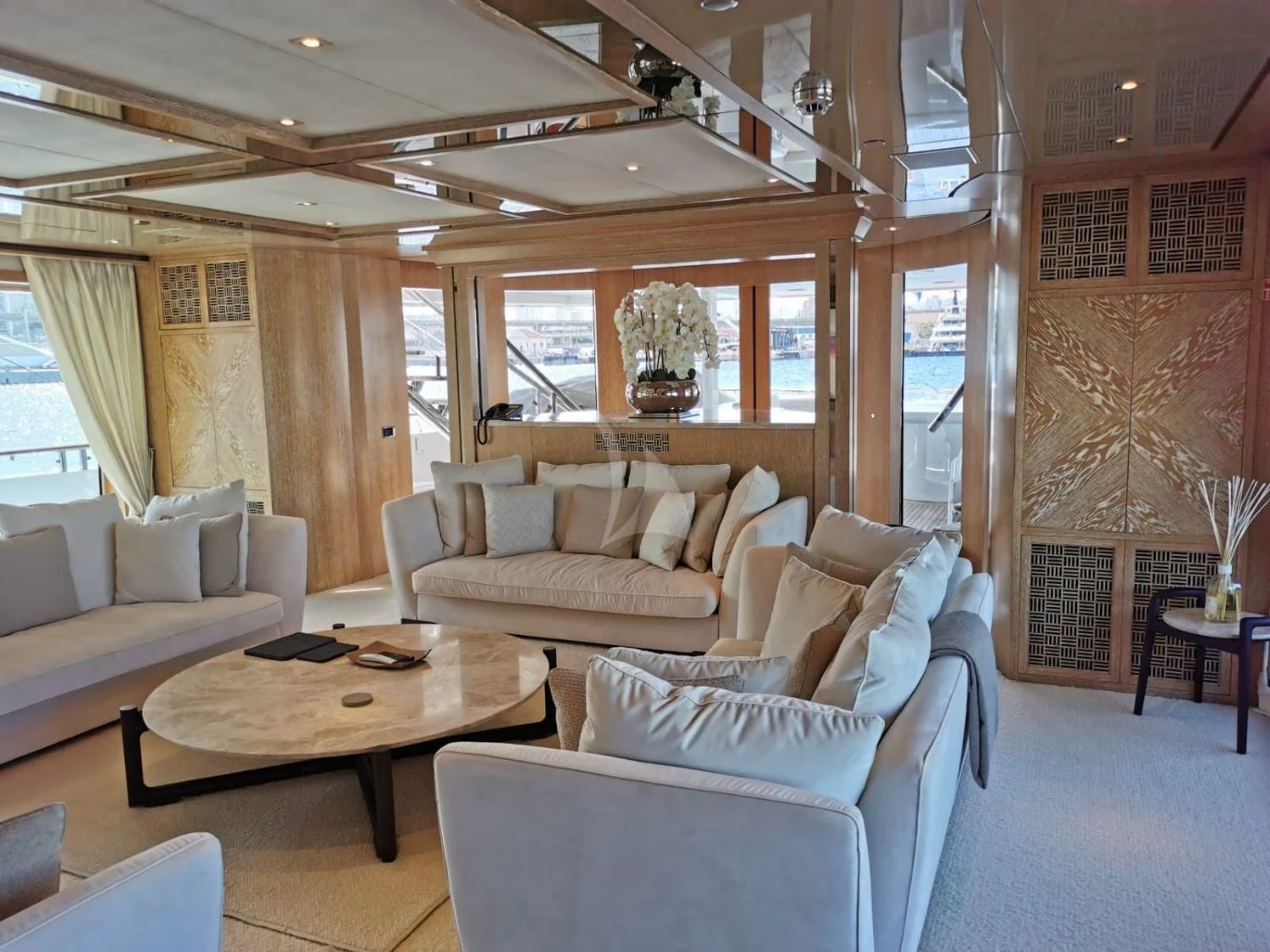 a living room with a couch and a table aboard FRIENDSHIP Yacht for Charter