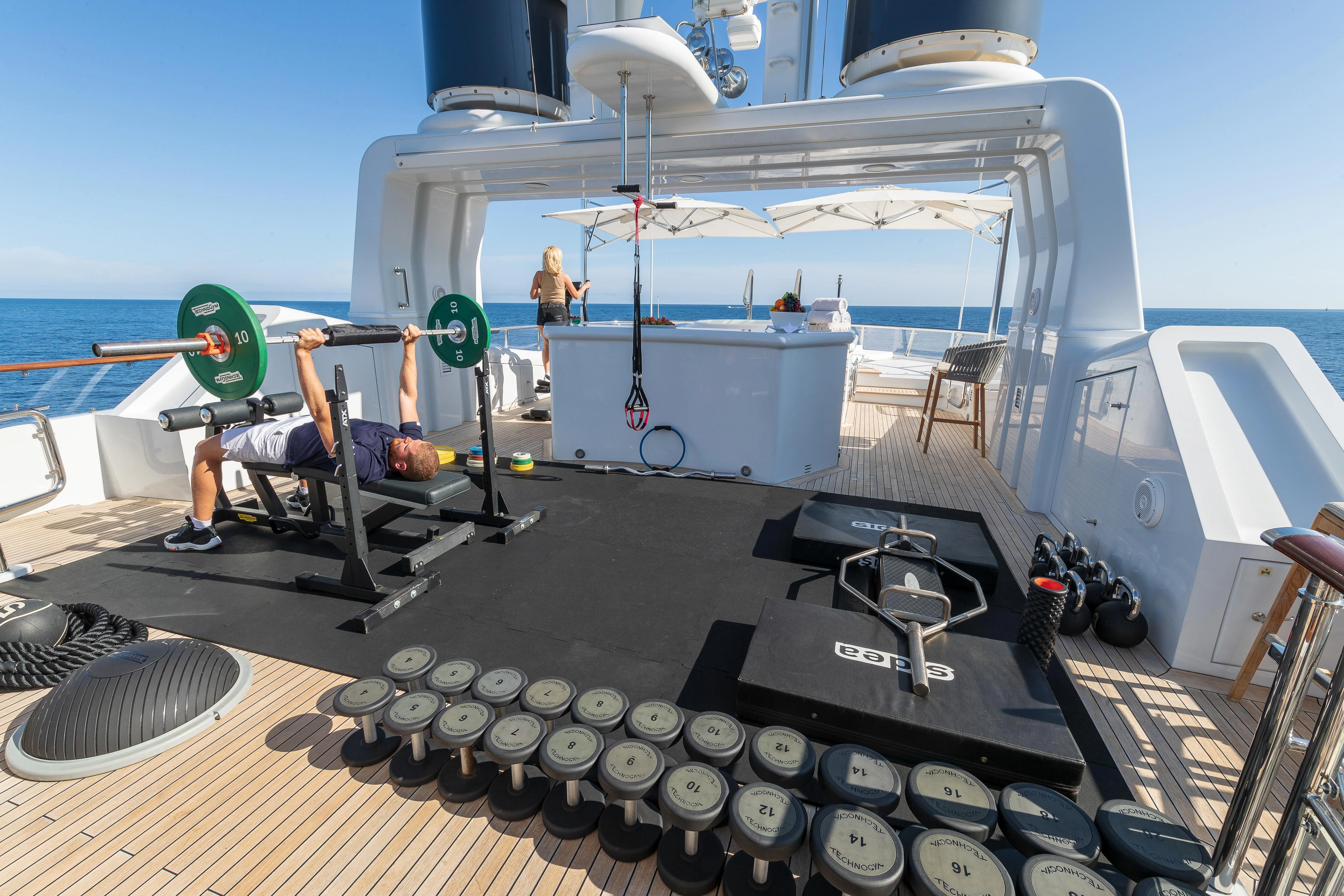 a large white boat with knobs aboard FRIENDSHIP Yacht for Charter
