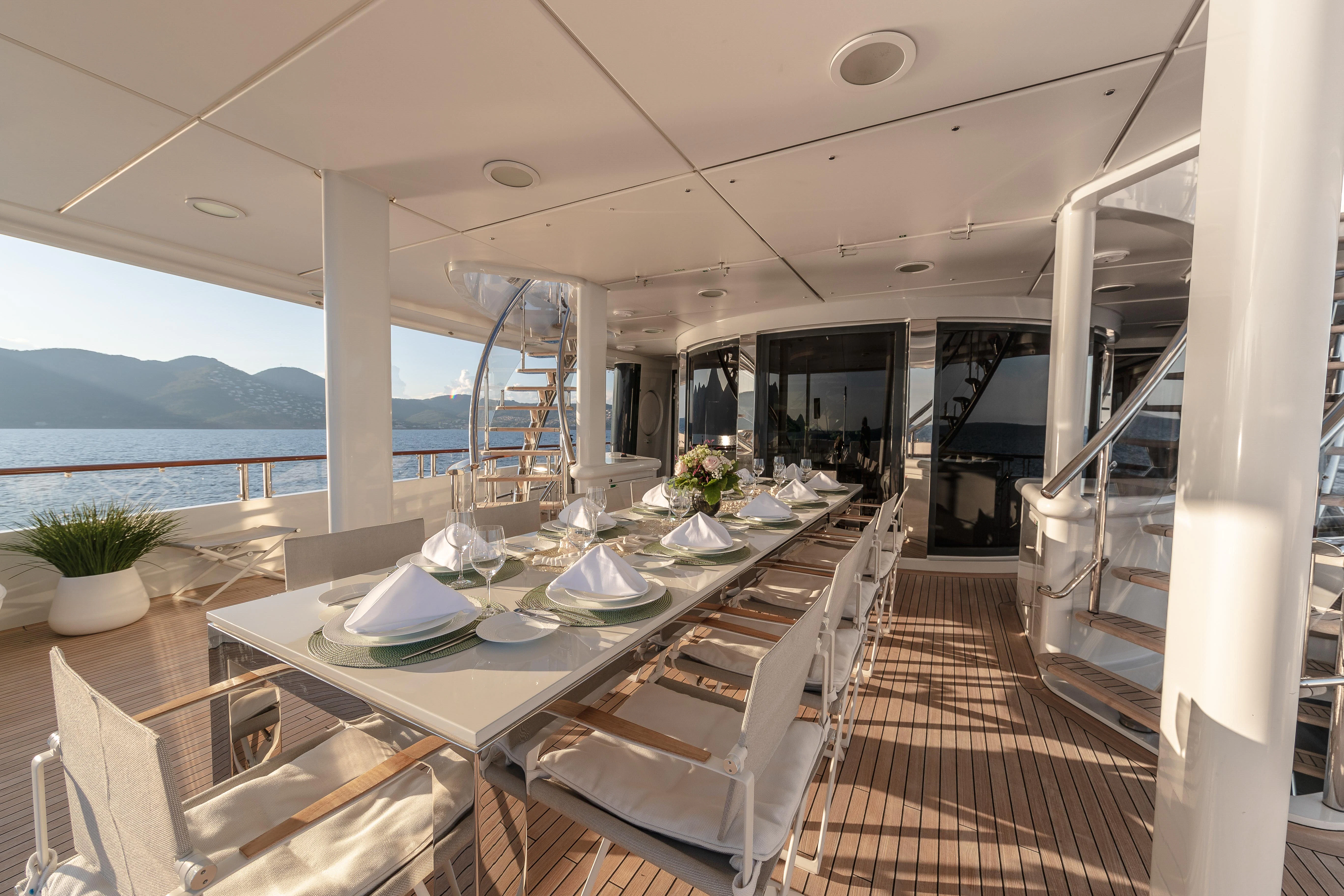 a table set for a meal on a boat aboard FRIENDSHIP Yacht for Charter