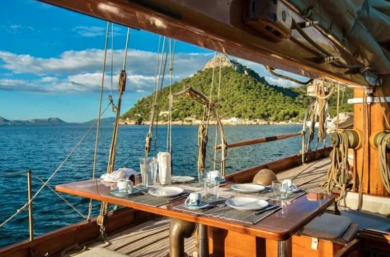 a table on a boat aboard SO FONG Yacht for Sale