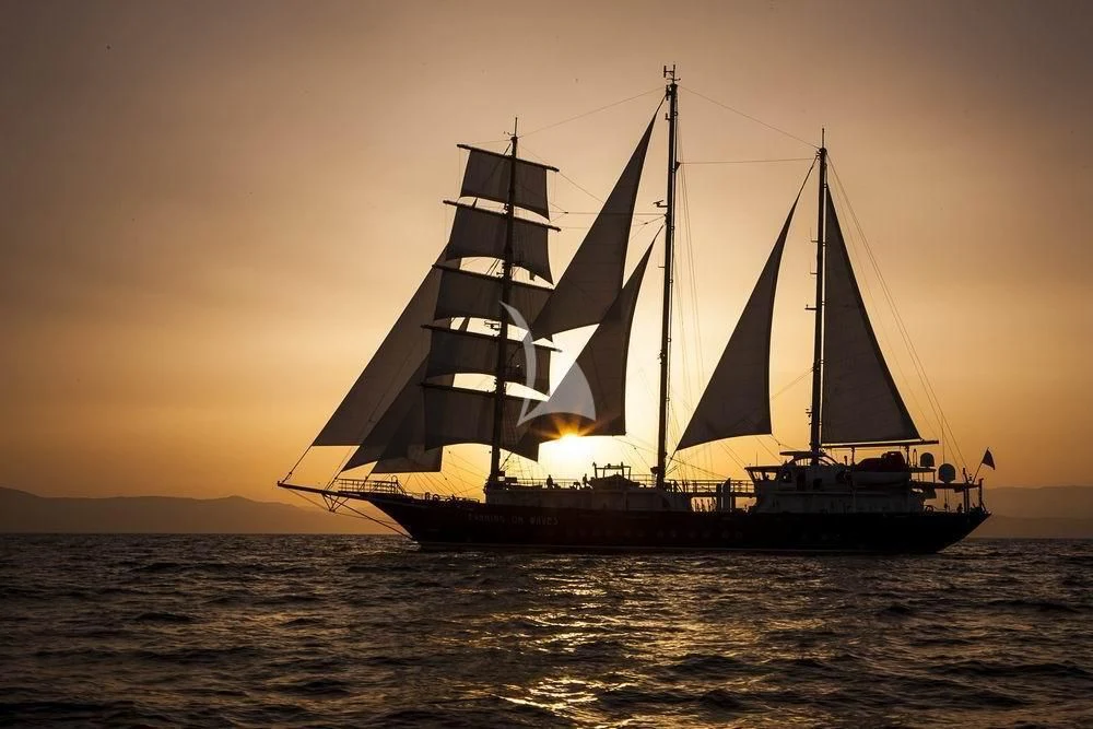 a sailboat on the water aboard RUNNING ON WAVES Yacht for Charter