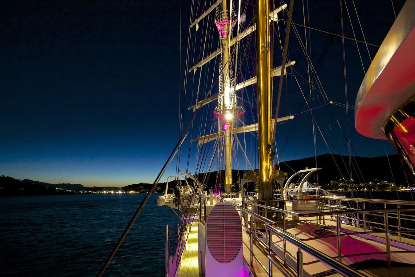 a large ship with a large sail aboard RUNNING ON WAVES Yacht for Charter