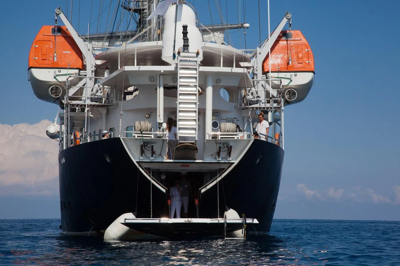 a large boat in the water aboard RUNNING ON WAVES Yacht for Charter