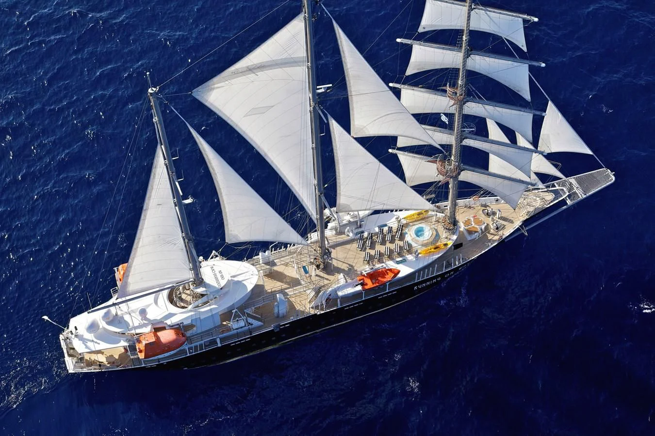 a ship in the water aboard RUNNING ON WAVES Yacht for Charter