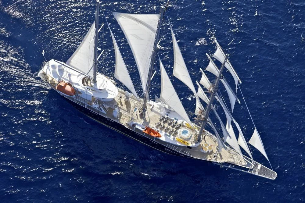 a ship in the water aboard RUNNING ON WAVES Yacht for Charter