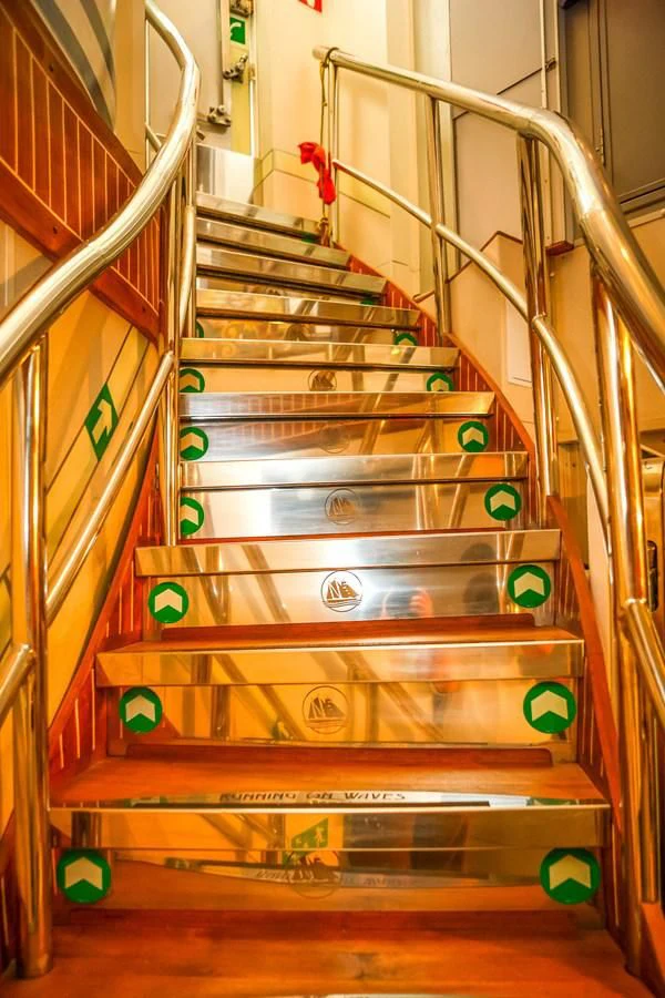 a metal staircase with a metal frame aboard RUNNING ON WAVES Yacht for Charter
