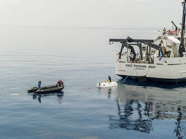 a group of people on a boat aboard DAGON Yacht for Sale