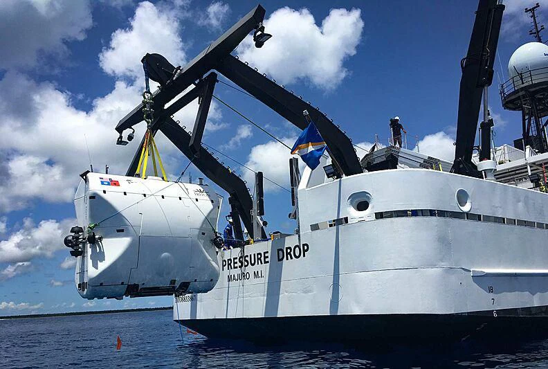 a large white ship with flags on it aboard DAGON Yacht for Sale