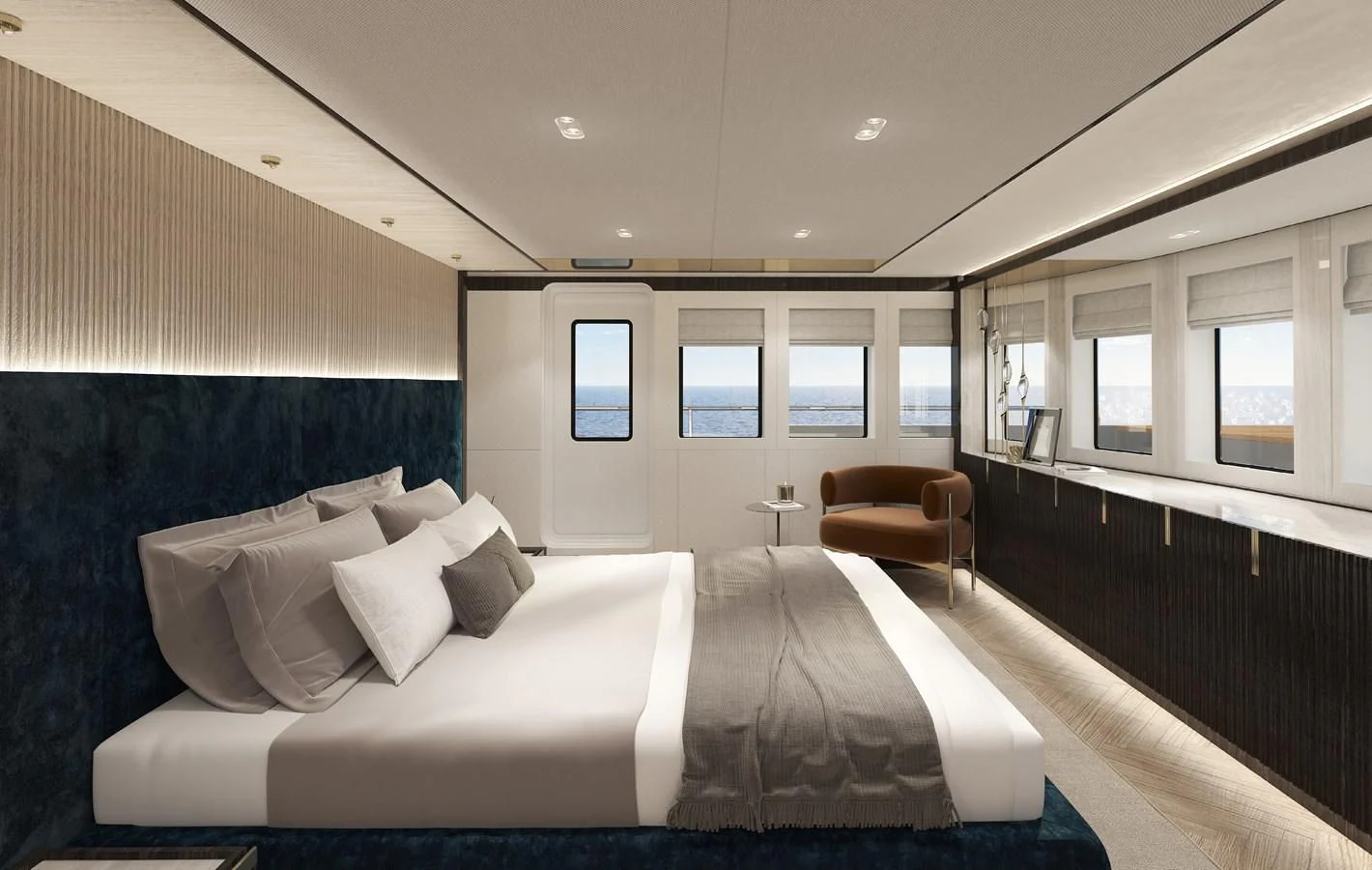 a room with a bed and a chair aboard 54M SUPERYACHT HULL Yacht for Sale