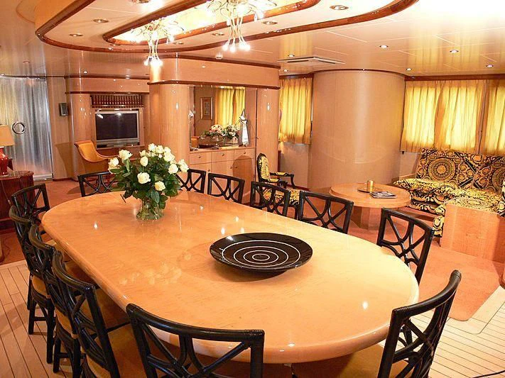 a dining room with a table and chairs aboard 54M SUPERYACHT HULL Yacht for Sale