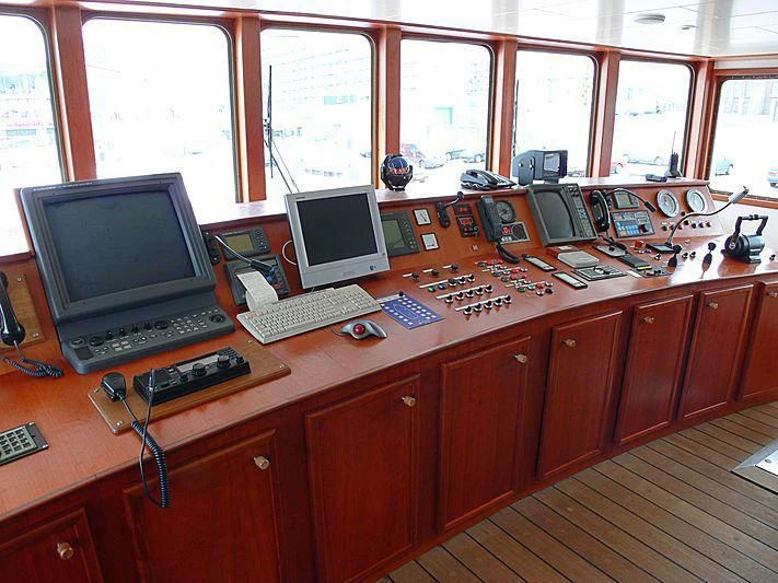 a laptop sits on a desk aboard 54M SUPERYACHT HULL Yacht for Sale