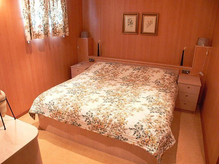 a bed in a room aboard 54M SUPERYACHT HULL Yacht for Sale