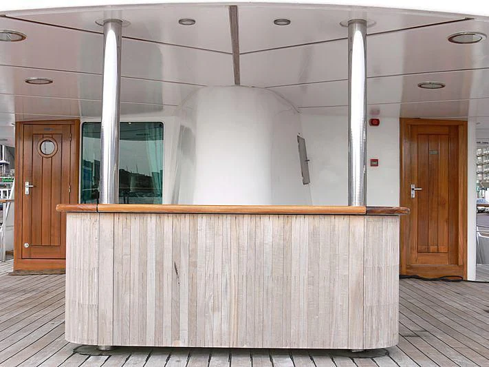 a large room with wooden floors aboard 54M SUPERYACHT HULL Yacht for Sale