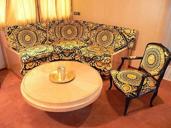 a table with a plate and a chair aboard 54M SUPERYACHT HULL Yacht for Sale