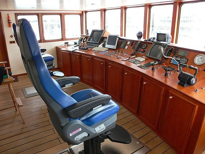 a room with a desk and chairs aboard 54M SUPERYACHT HULL Yacht for Sale