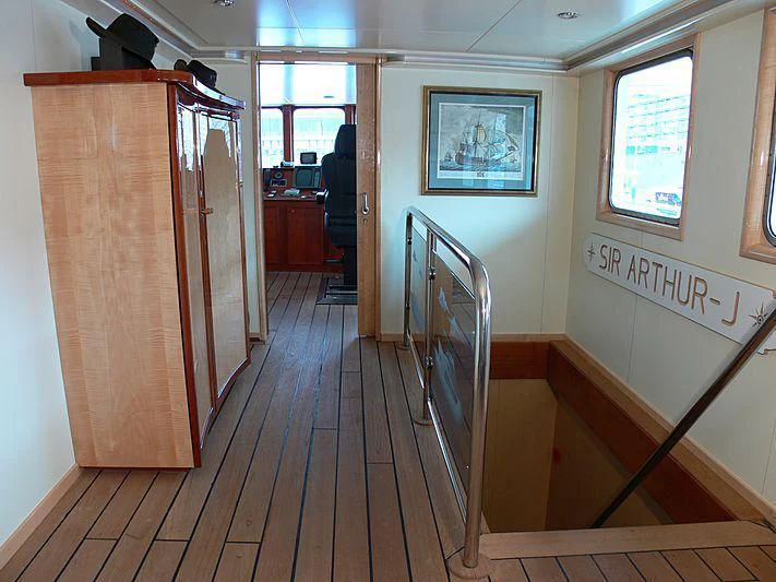 a wood cabinet in a room aboard 54M SUPERYACHT HULL Yacht for Sale