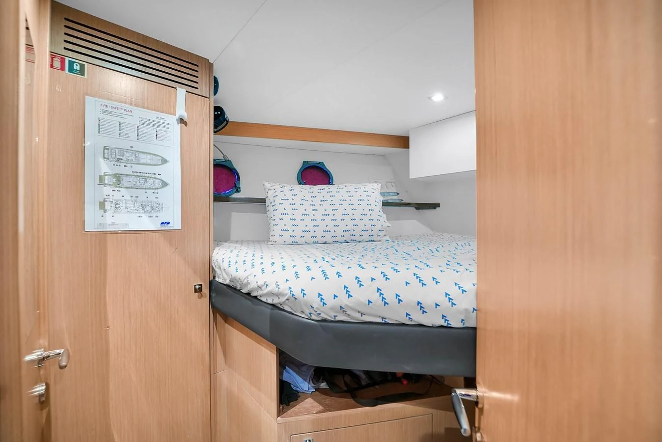 a small bed in a room aboard FERRETTI YACHTS F800 Yacht for Sale
