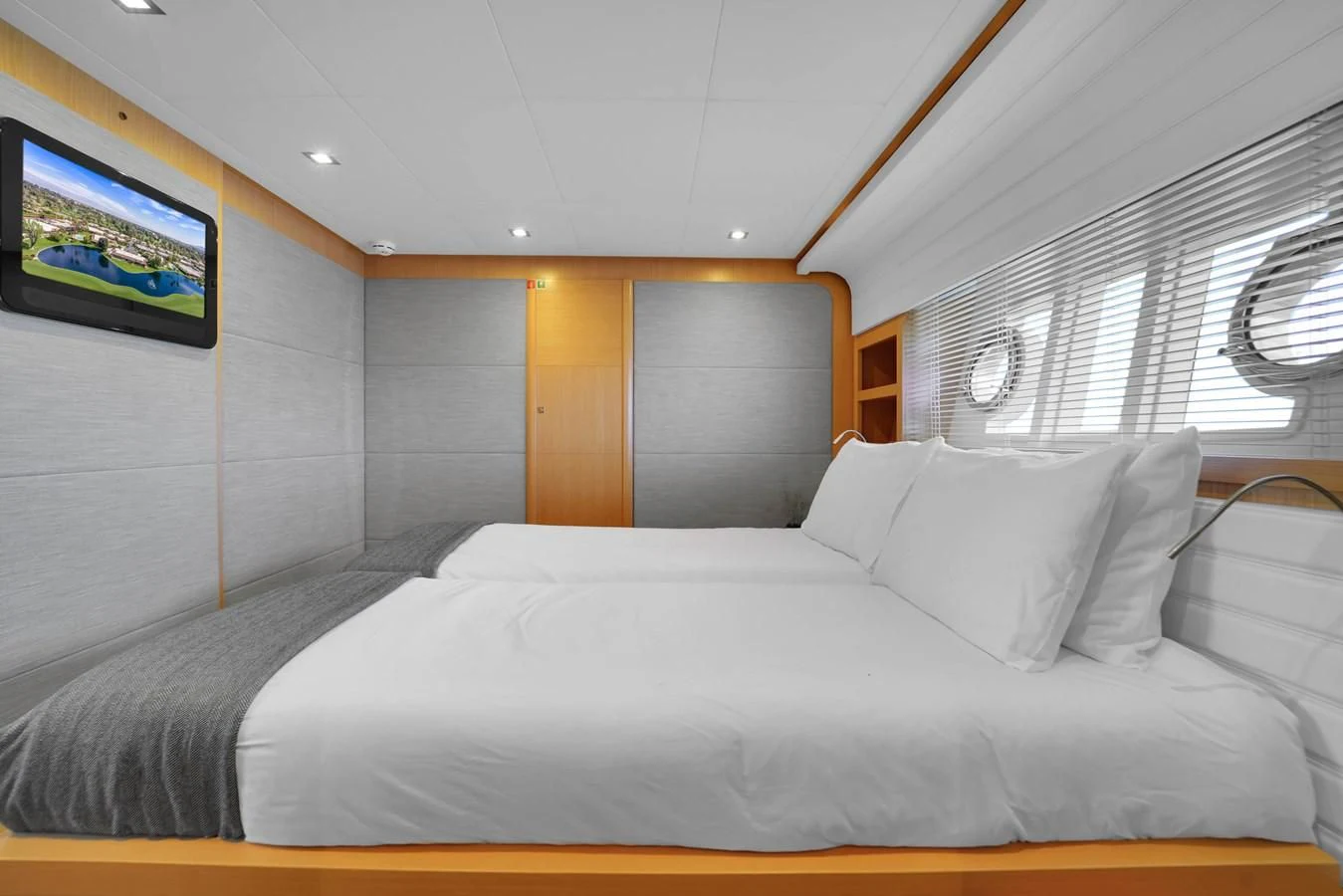 a bed with white sheets aboard FERRETTI YACHTS F800 Yacht for Sale