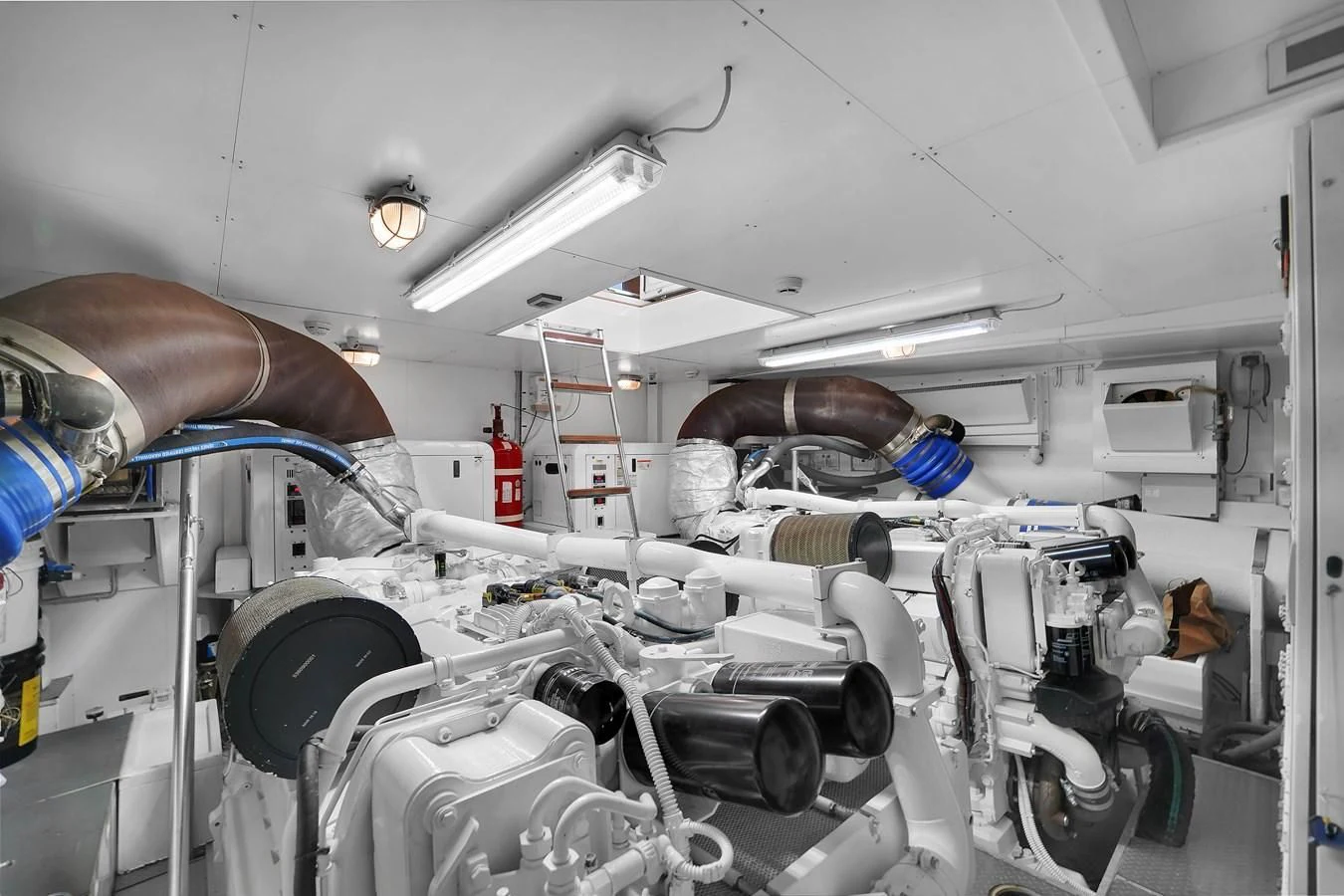 a room full of white machines aboard FERRETTI YACHTS F800 Yacht for Sale