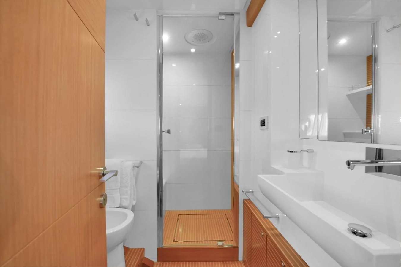 a bathroom with a glass shower aboard FERRETTI YACHTS F800 Yacht for Sale