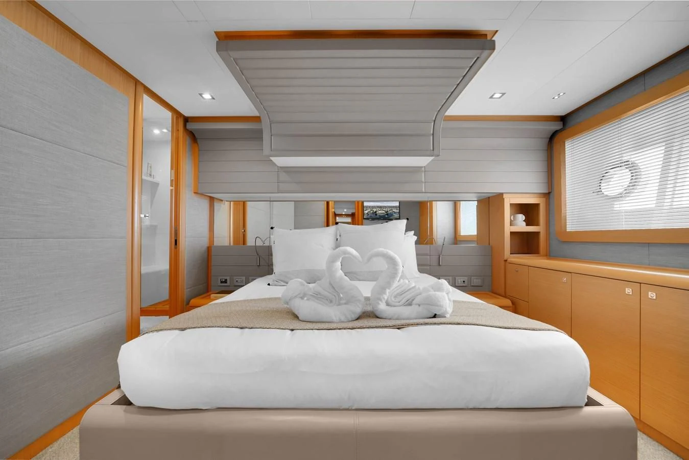 a bed with white sheets aboard FERRETTI YACHTS F800 Yacht for Sale