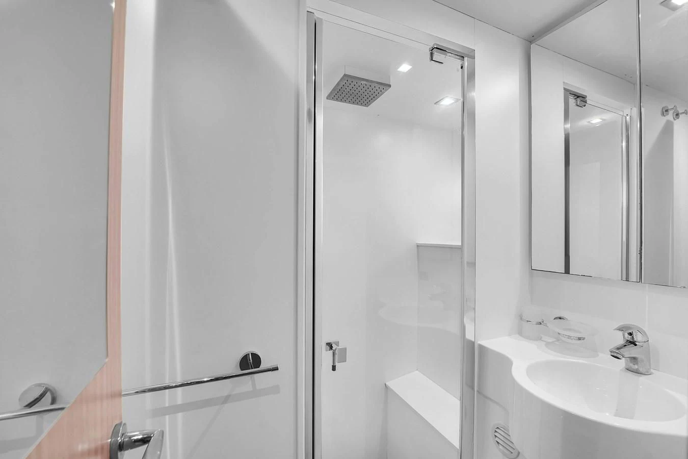 a bathroom with a glass shower aboard FERRETTI YACHTS F800 Yacht for Sale