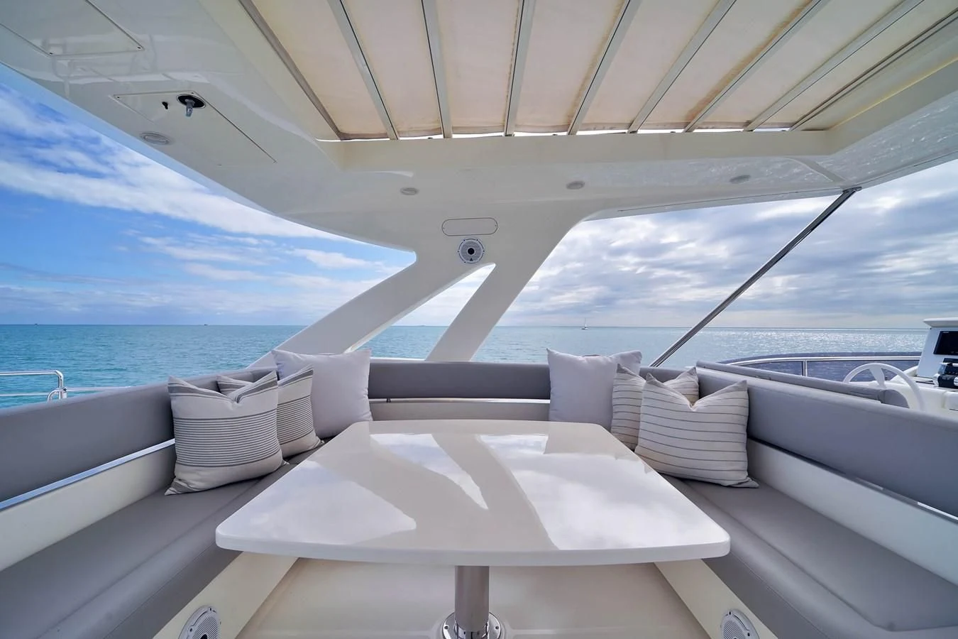 a boat with pillows on a deck aboard FERRETTI YACHTS F800 Yacht for Sale