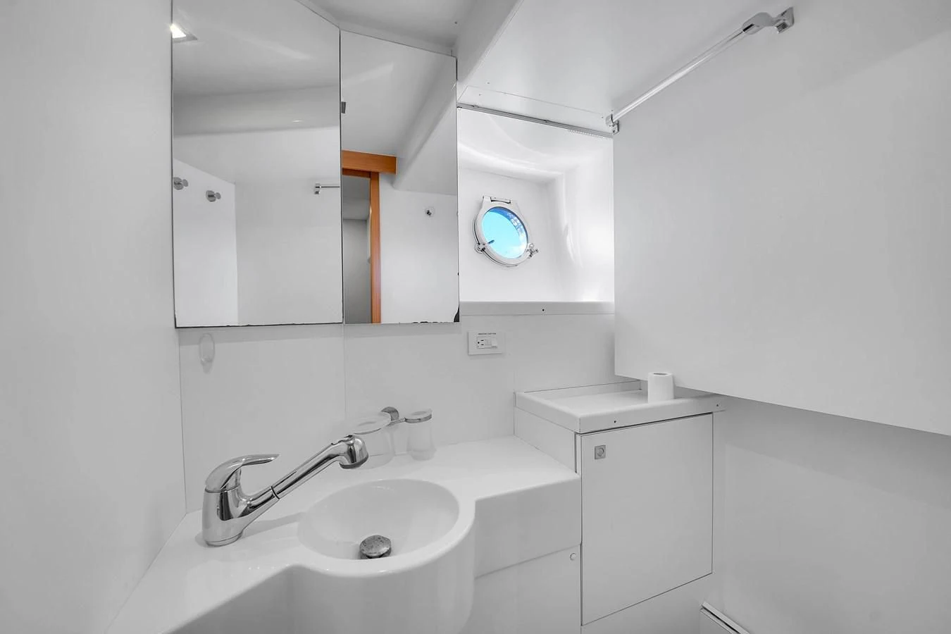 a bathroom with a sink and a mirror aboard FERRETTI YACHTS F800 Yacht for Sale