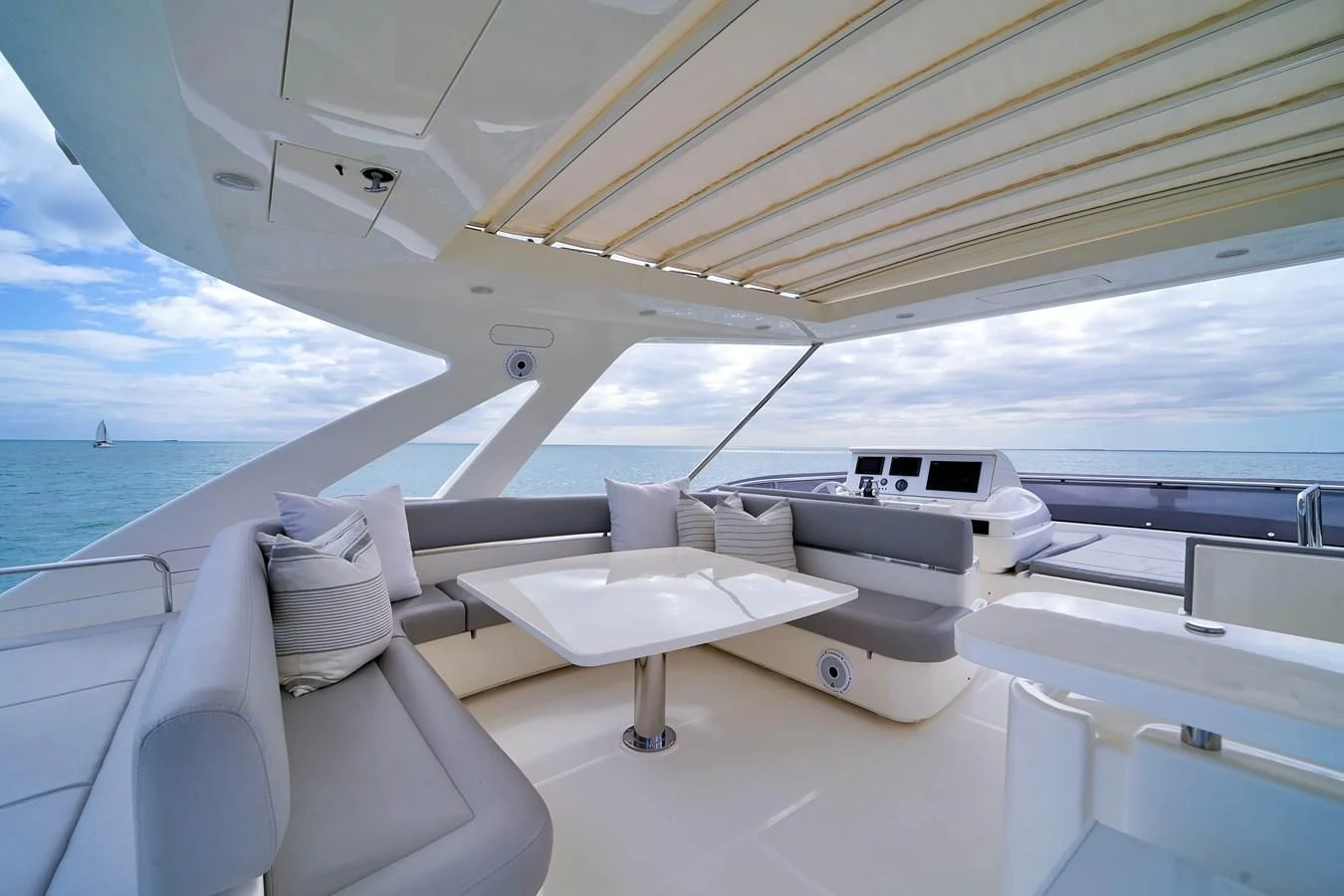 a boat with white furniture aboard FERRETTI YACHTS F800 Yacht for Sale