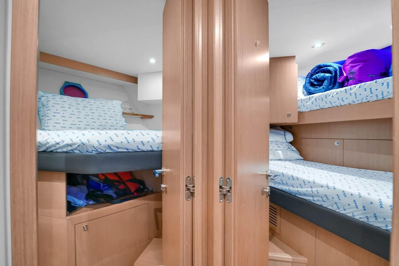 a room with bunk beds aboard FERRETTI YACHTS F800 Yacht for Sale