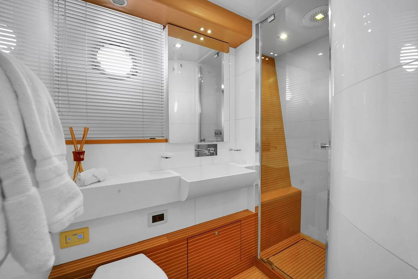 a bathroom with a sink and a mirror aboard FERRETTI YACHTS F800 Yacht for Sale