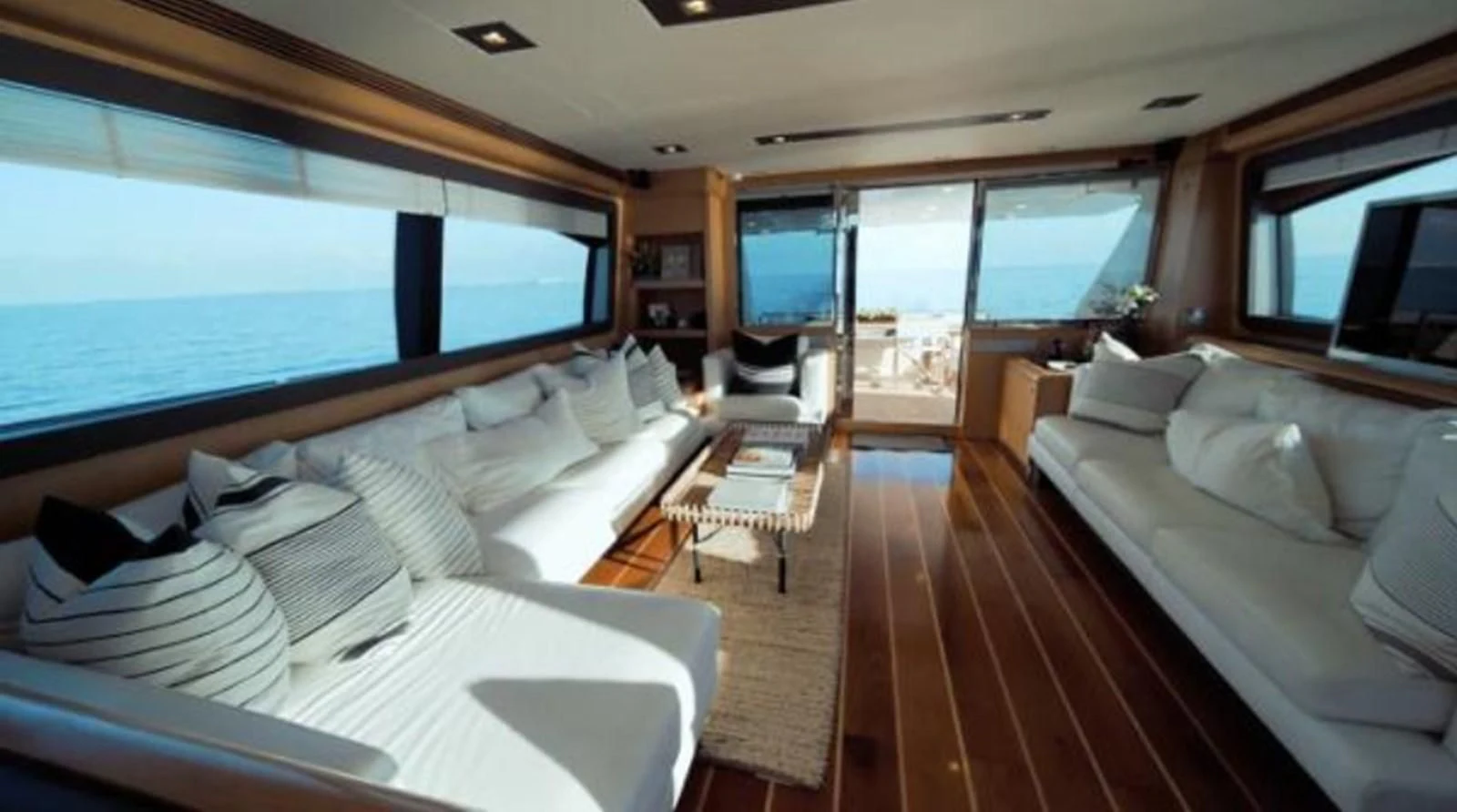 a large room with a bed and a large window aboard FERRETTI YACHTS F800 Yacht for Sale