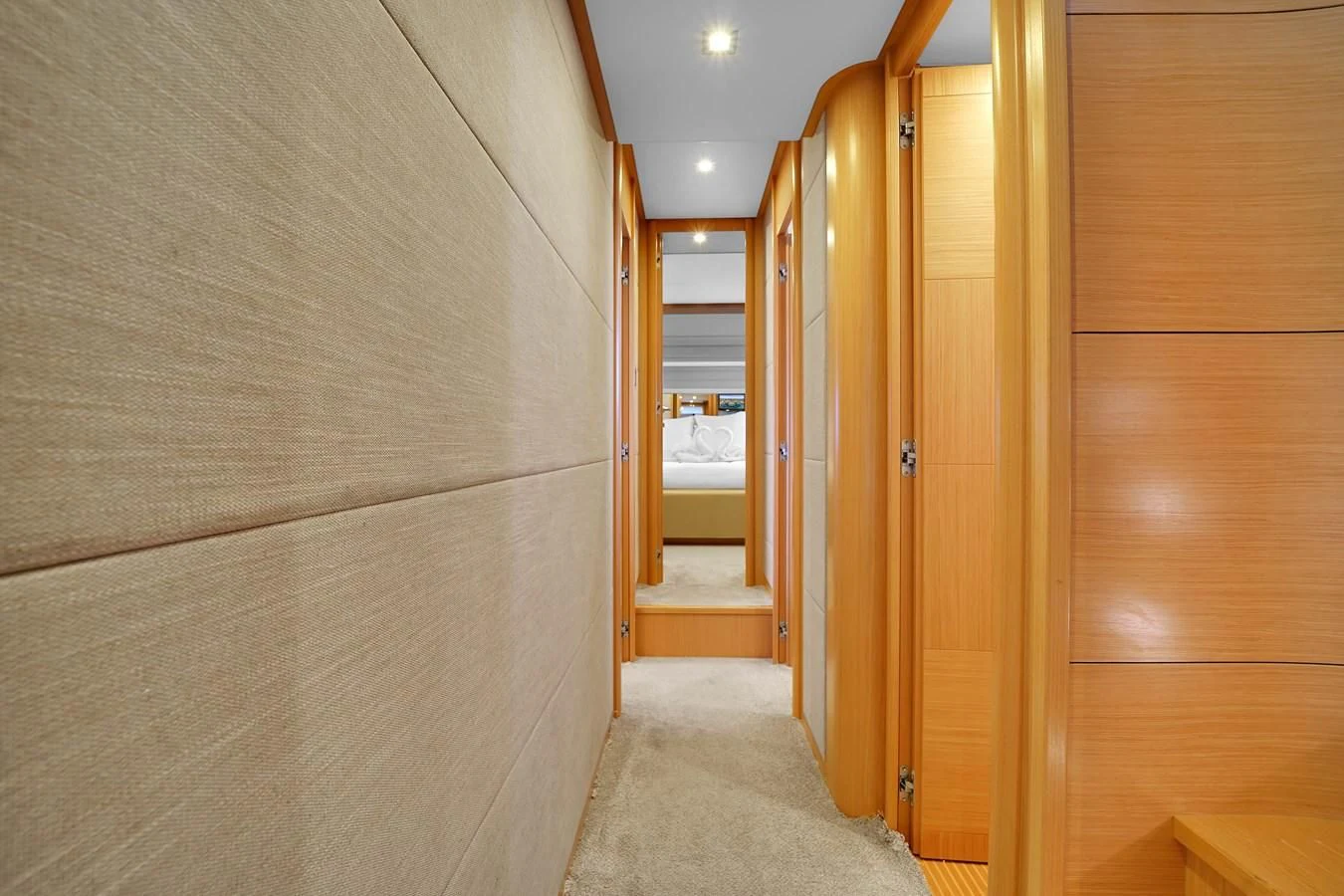 a room with wooden doors aboard FERRETTI YACHTS F800 Yacht for Sale