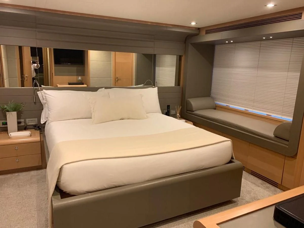 a bed in a room aboard FERRETTI YACHTS F800 Yacht for Sale