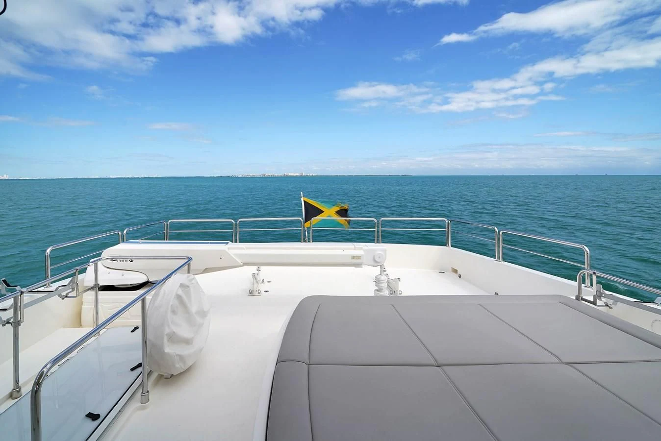 a white boat with a yellow chair on the deck aboard FERRETTI YACHTS F800 Yacht for Sale