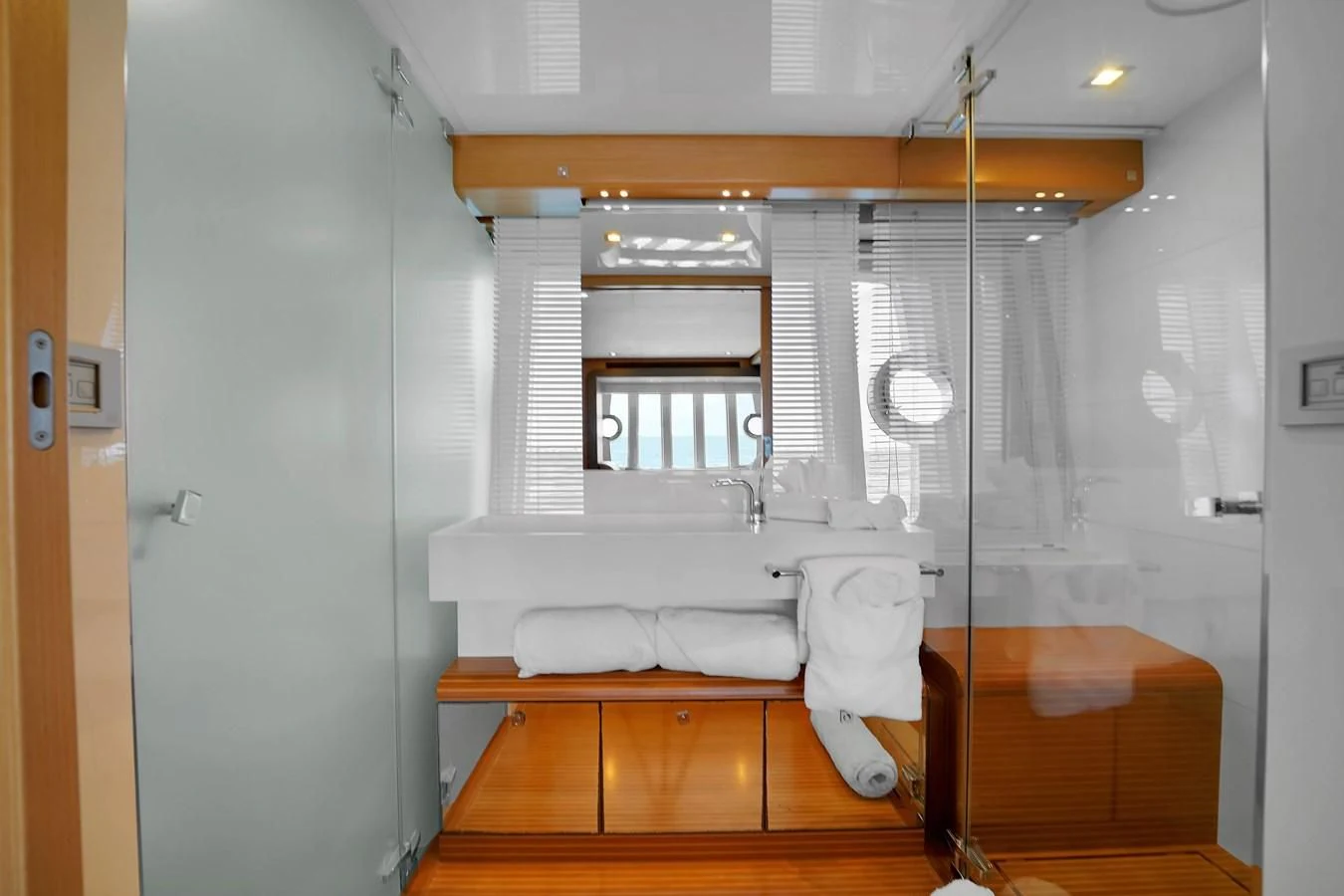 a bathroom with a shower unit and a sink aboard FERRETTI YACHTS F800 Yacht for Sale