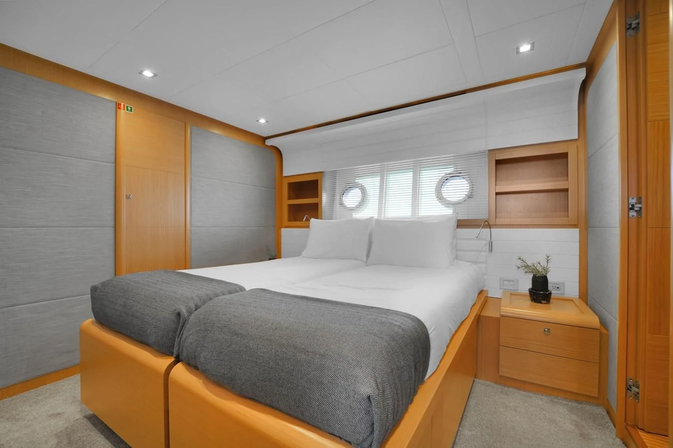 a bed in a room aboard FERRETTI YACHTS F800 Yacht for Sale
