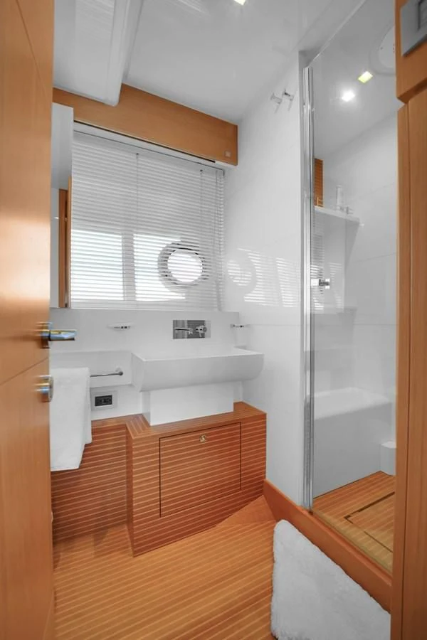 a bathroom with a tub and sink aboard FERRETTI YACHTS F800 Yacht for Sale