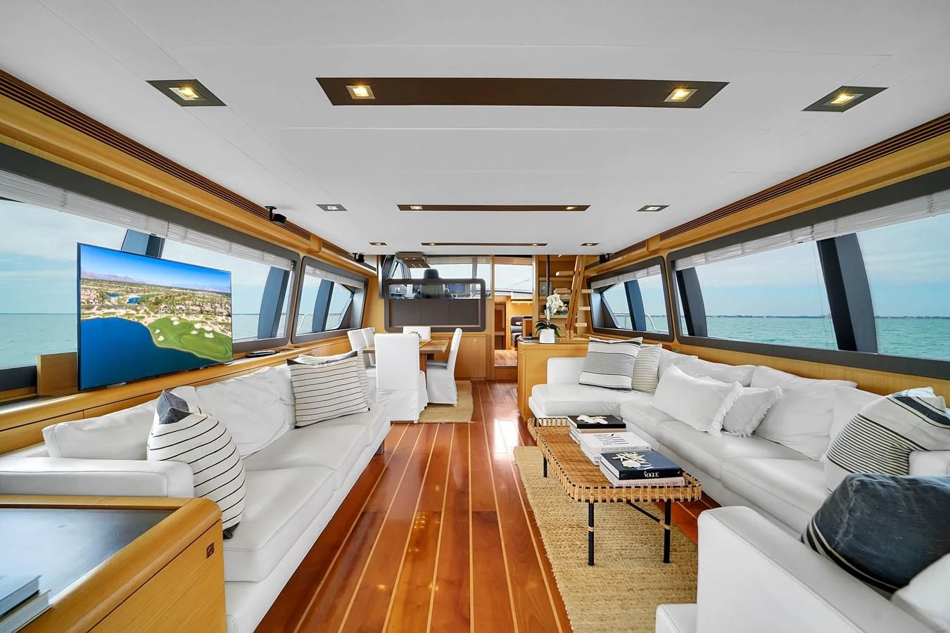 a room with a bed and a couch aboard FERRETTI YACHTS F800 Yacht for Sale
