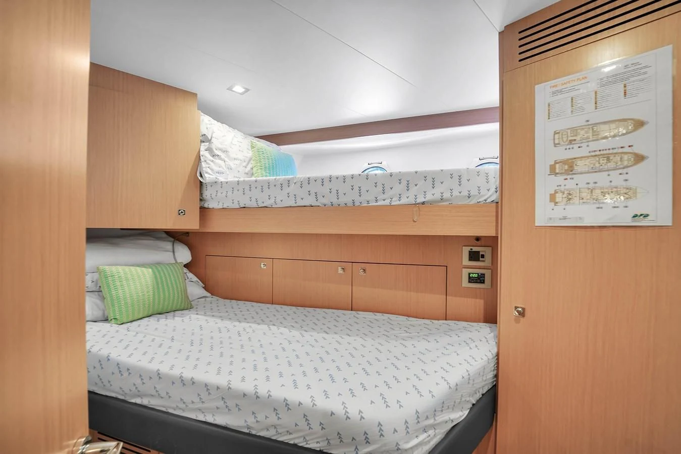 a room with a bed and a desk aboard FERRETTI YACHTS F800 Yacht for Sale