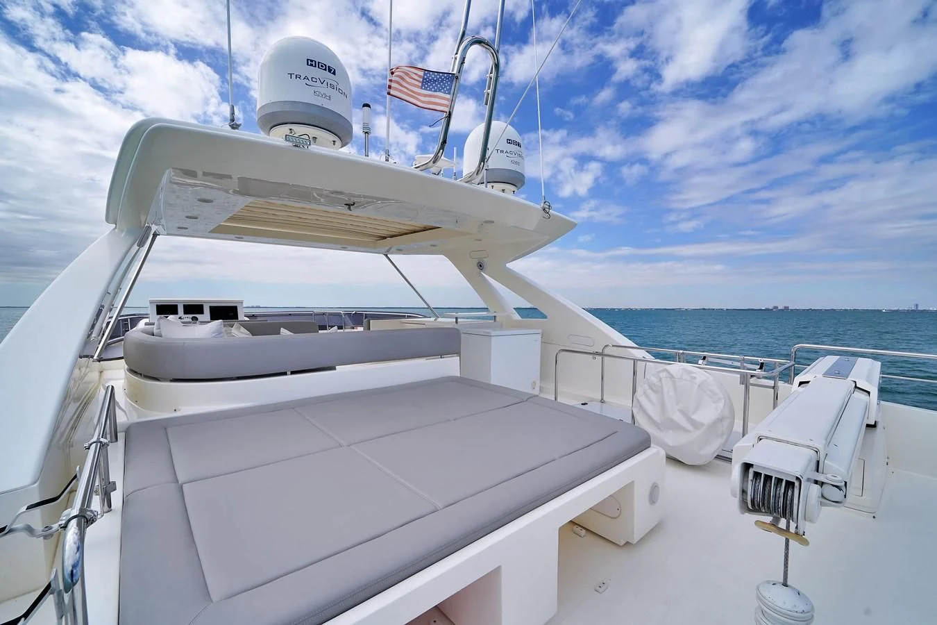 a boat with flags on it aboard FERRETTI YACHTS F800 Yacht for Sale