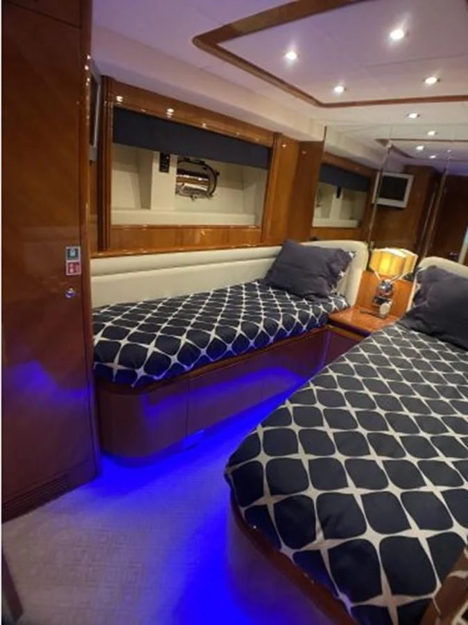 a couple of beds in a room aboard 85 AZIMUT ULTIMATE Yacht for Sale