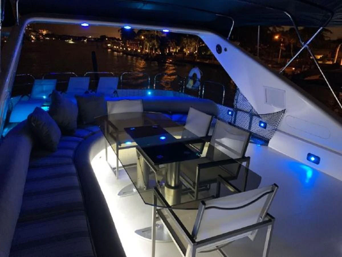 a room with a view of a city and lights aboard 85 AZIMUT ULTIMATE Yacht for Sale
