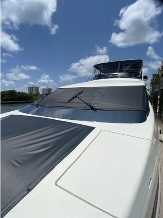 a white yacht on the water aboard 85 AZIMUT ULTIMATE Yacht for Sale