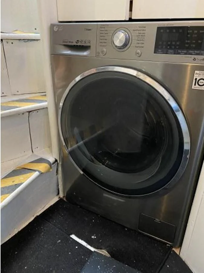 a black washing machine aboard 85 AZIMUT ULTIMATE Yacht for Sale