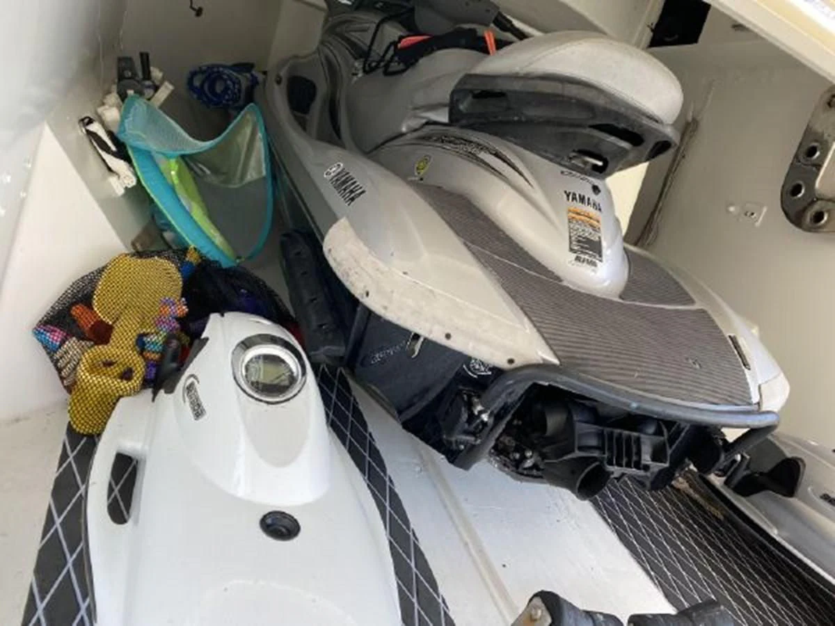 a car with its hood open aboard 85 AZIMUT ULTIMATE Yacht for Sale