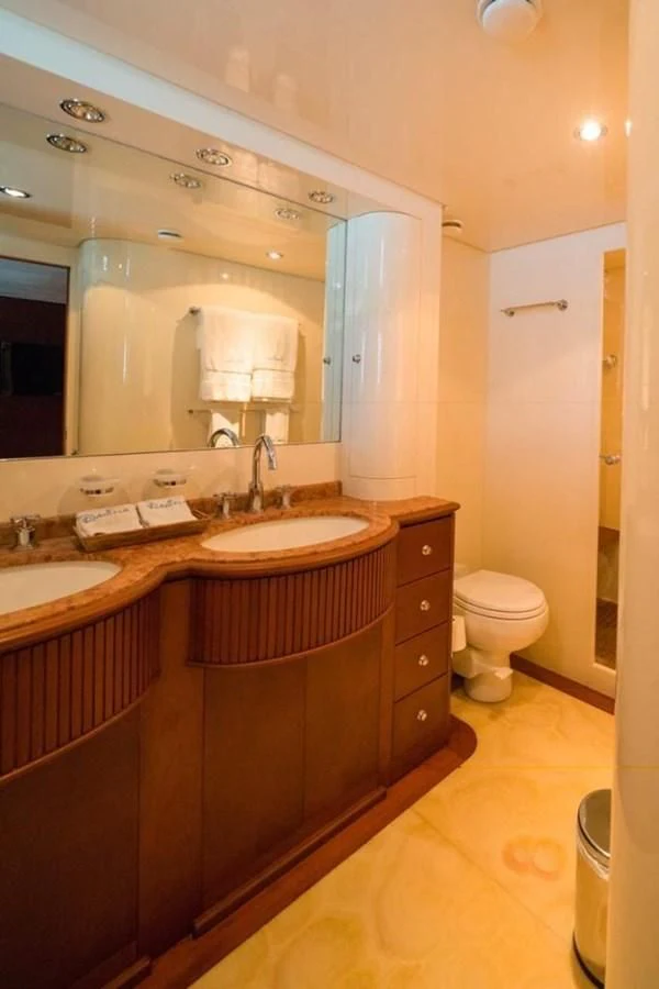 a bathroom with a sink and a toilet aboard DANIELA Yacht for Sale